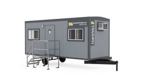 8x24 office trailer exterior with entry stairs and HVAC unit, Triumph Modular branding visible
