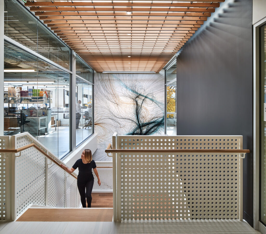 a stairwell in a two story modular building used for a science and technology center in Cambridge, MA