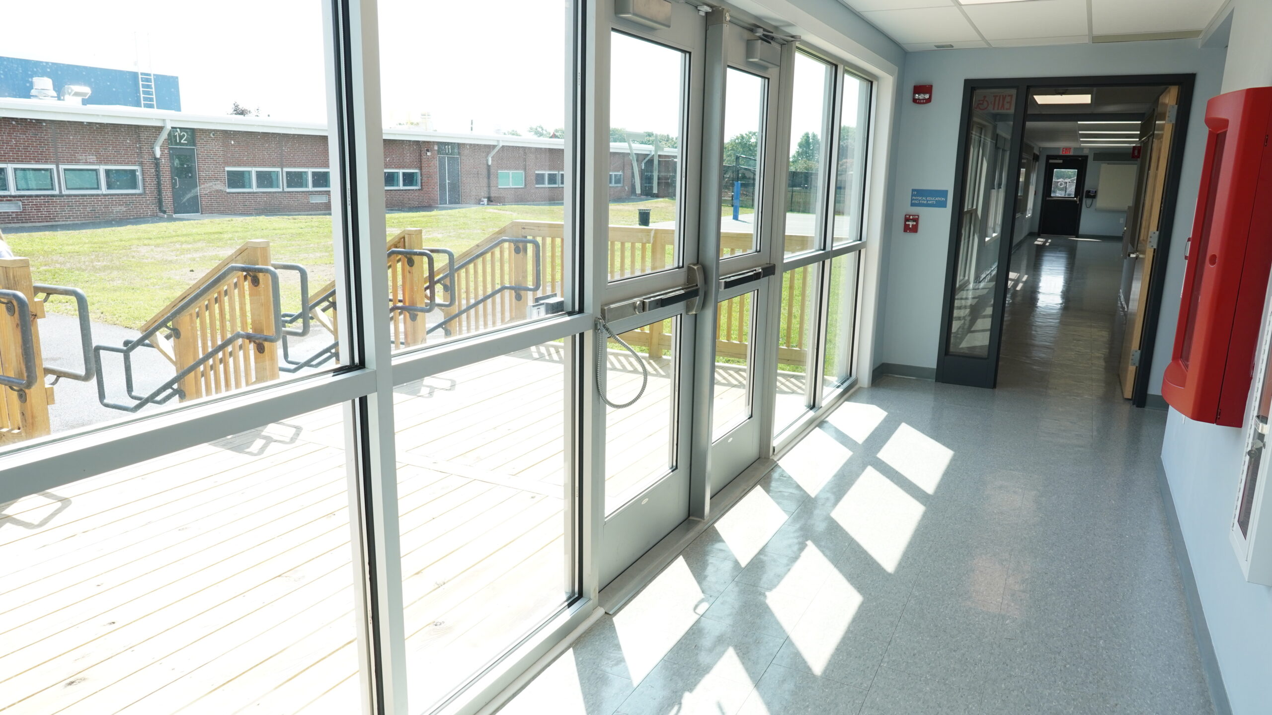 Interior Foyer with large glass windows and doors