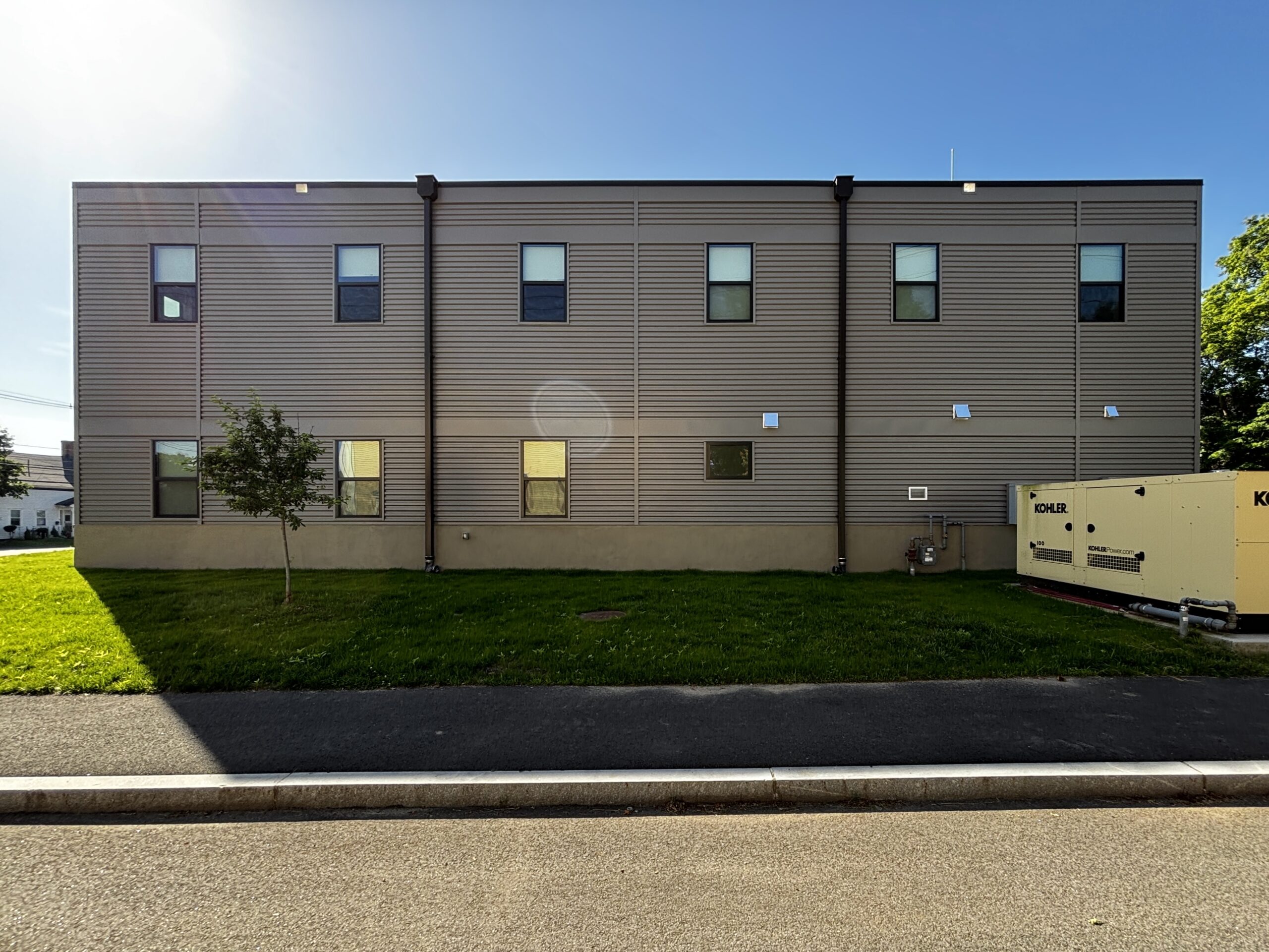 Side view of two story fire station living quarters