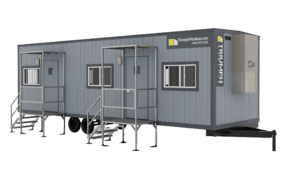 10x36 office trailer with white siding and front steps, designed for jobsite use